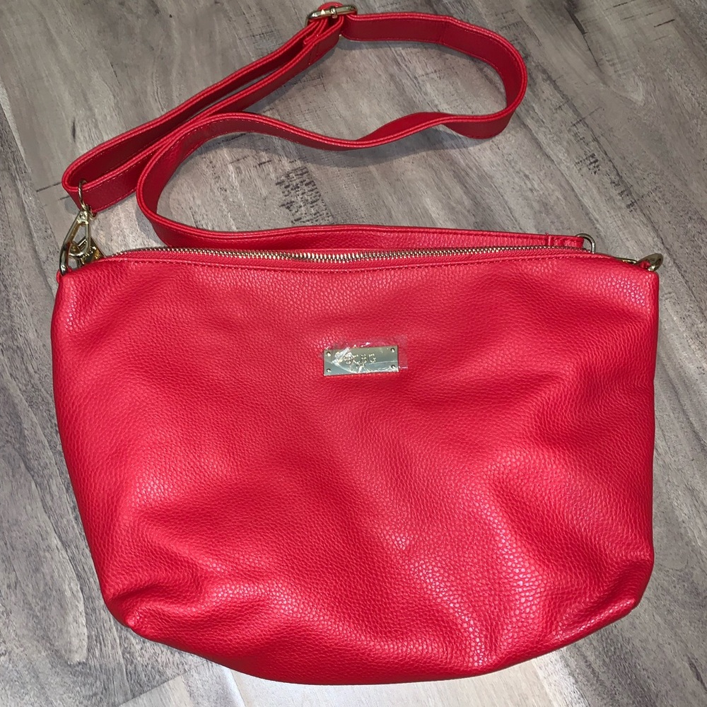 Woman’s BCBG Red Leather purse